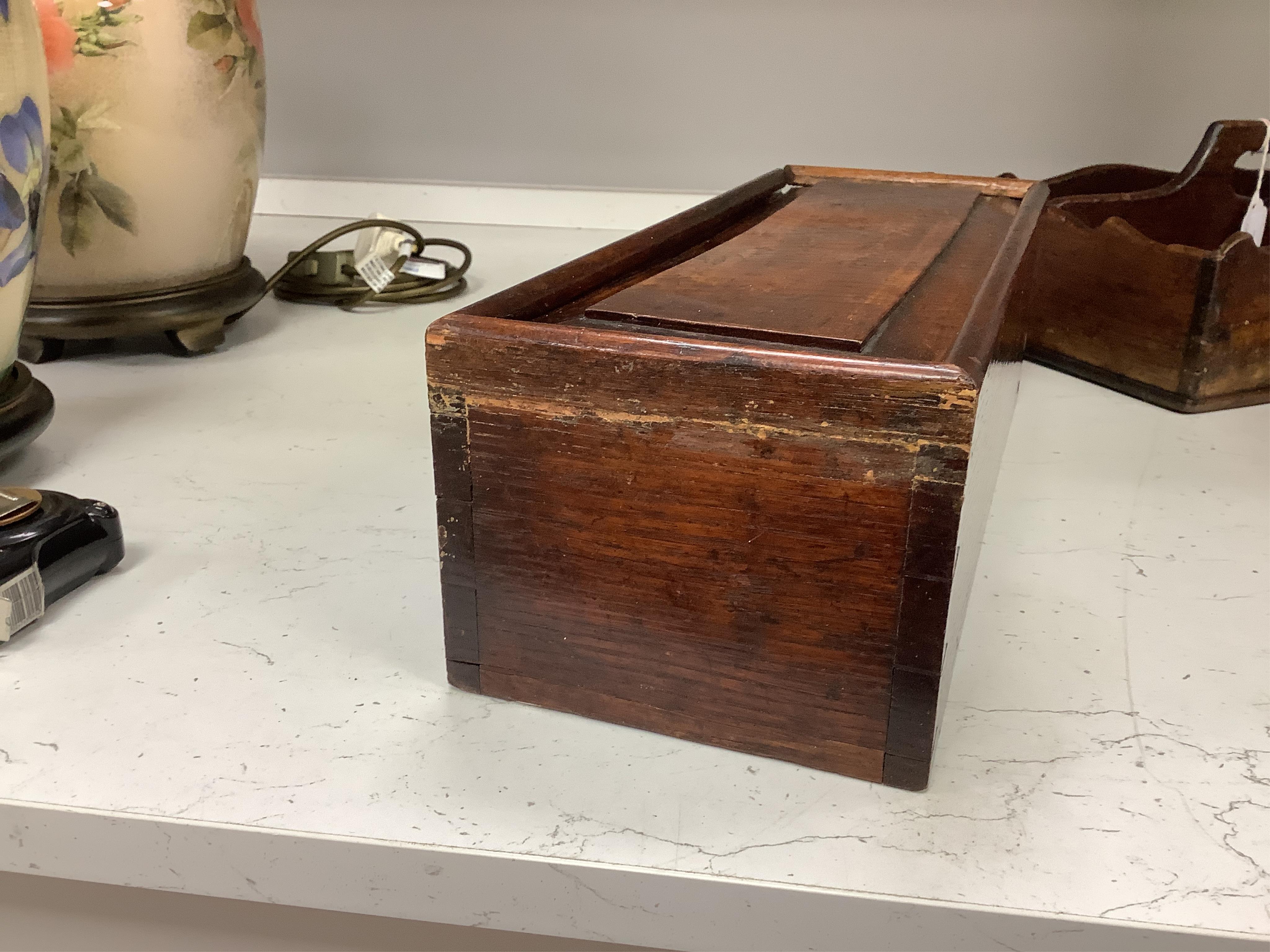 A George III mahogany cutlery tray, together with an oak hanging candle box, largest 48cm high. Condition - fair to good